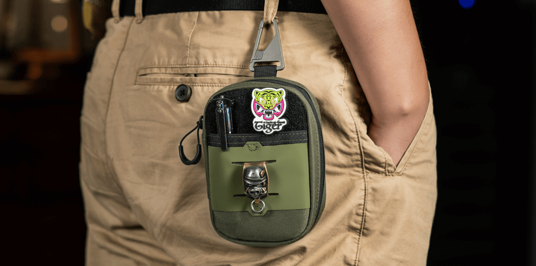 This picture shows the EDC organizer bag hanging from a belt.